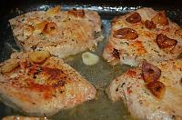 Oven Roasted Pork Chops with Garlic and Wine