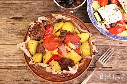 Kleftiko - meat steak and vegetables, Greek-style